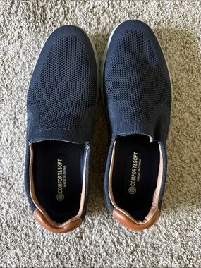 Men’s Navy with leather accent slip on shoes. Size 45.5